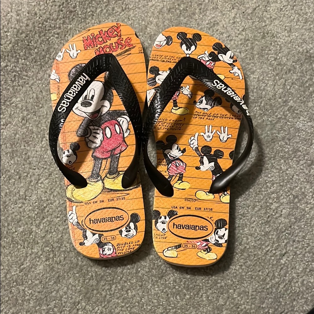 Havaianas Black and Orange Cartoon Flip Flops